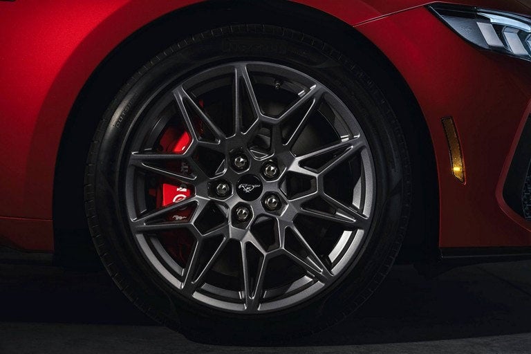 2024 Ford Mustang® model with a close-up of a wheel and brake caliper | Rydell Ford in Independence IA