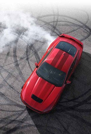 Overhead view of a 2024 Ford Mustang® model with tire tracks on pavement | Rydell Ford in Independence IA